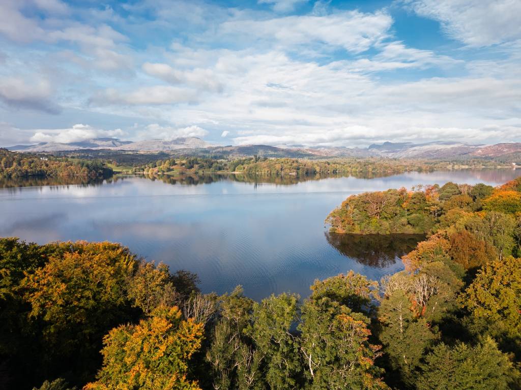 View of Lake Windermere and surrounding fells in Autumn, from Cragwood's private jetty